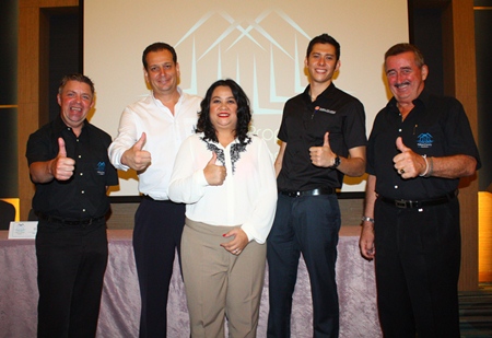 Paul Strachan (left) and John Collingbourne (right) are joined by Paul Sutton (2nd left) from Powerhouse Development, May Watson (center) from Matrix and Lorenzo Joaquin (2nd right) from Global Top Group.