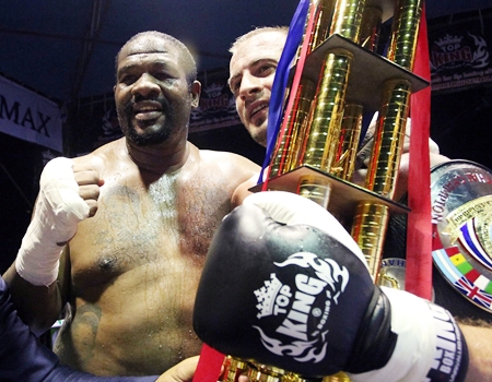 Former heavyweight boxing champion Riddick Bowe of the U.S. (left) congratulates champion Levgen Golovin (right) after the Russian halted Bowe’s challenge in their World Muay Thai Super-Heavyweight Championship fight at Pattaya’s Bali Hai Pier, Friday, June 14.  Bowe’s much vaunted ring comeback lasted barely 5 minutes before he was sent to the canvass and counted out following a kick from Golovin in the second round of the contest. (AP Photo/Apichart Weerawong)