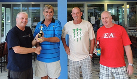 General Jack (2nd left) presents the winning monthly trophy to Sel Wegner (left), with Paul Bourke and Steve Milne looking on.