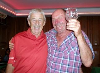 Terry Mangan (left) congratulates golfer of the month JJ Mafray.