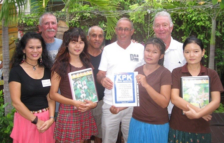 Tuesday’s winners pose with staff at The Relax Bar.