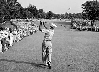 This iconic photo shows Ben Hogan hitting his approach to the final green of the 1950 US Open golf tournament at Merion Golf Club.