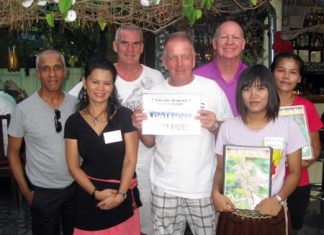 Kristinn justs get better & better Tuesday’s winners pose with the staff at The Relax Bar.