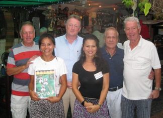 Tuesday’s winners pose with staff at The Relax Bar.