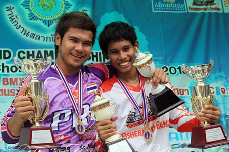 Happy winners with their trophies.
