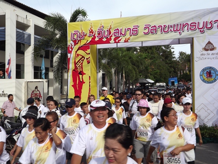 Runners and walkers get underway at the walk-run marathon for Visakha Bucha Day on Pratamnak Hill, Friday, May 24.