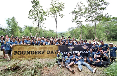 Hard Rock staff pose for a group photo at the Khao Chi-On non-hunting area in Sattahip, June 14.