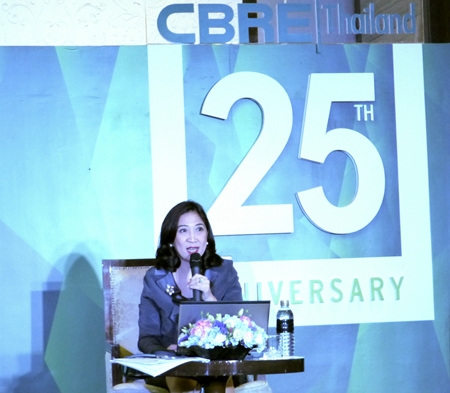 CBRE Thailand Managing Director, Aliwassa Pathnadabutr, talks during a press conference marking the company’s 25 years of business in Thailand.
