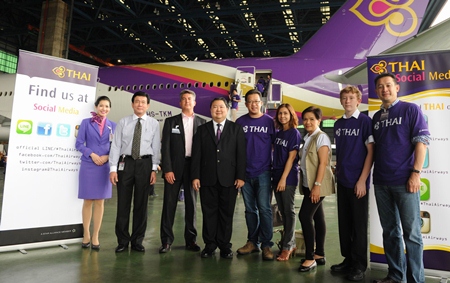 Danuj Bunnag (4th left), Executive Vice President, Product & Customer Services, Thai Airways International Public Company Limited (THAI), recently welcomed a group of social media and Facebook Fanpage members on a tour of THAI’s new Boeing 777-300ER aircraft at THAI’s Technical Department, Suvarnabhumi Airport. Mrs. Sunathee Isvarphornchai (3rd right), THAI Vice President, E-Customer Relations Department; Rangsiman Mokkhasmit (2nd left), and Kent D. Craver (3rd left), Regional Director, Cabin Experience & Revenue Analysis Marketing, Boeing, were also present. THAI’s Boeing 777-300ER aircraft is used on flights to Seoul, Shanghai, Copenhagen and Los Angeles.