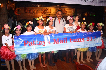 Peter (center) thanks the children from CPDC after their magical performance.