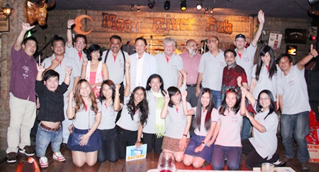 Senator Sutham Phanthusak (6th left) poses for a group photo with some of the Pattaya Mail Media Group staff