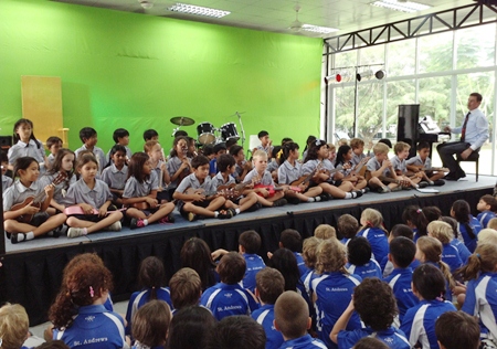 Year 3 children perform their ensemble piece consisting of ukuleles, recorders and percussion instruments.
