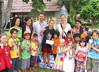 Poppy (centre) with her family and Yok.