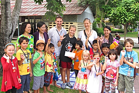 Poppy (centre) with her family and Yok.