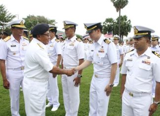 Royal Malaysian Navy Vice Adm. Datoh Abdul Hadi Binarazid greets the Thai troops, watched by Rear Adm. Rangsrit Satyanukul, head of the Royal Thai Navy’s Patrol Squadron.