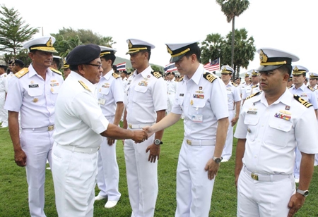 Royal Malaysian Navy Vice Adm. Datoh Abdul Hadi Binarazid greets the Thai troops, watched by Rear Adm. Rangsrit Satyanukul, head of the Royal Thai Navy’s Patrol Squadron.
