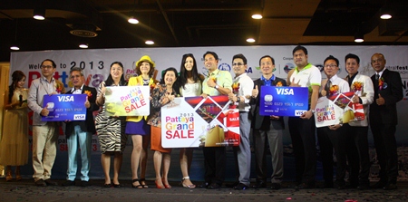 Pattaya Grand Sale 2013 sponsors take a group picture at the press conference launching the event at Central Festival Pattaya Beach.