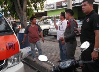 Nattapong Sutthikaew (front left, standing next to his van) has been questioned for allegedly raping a Thai go-go dancer.