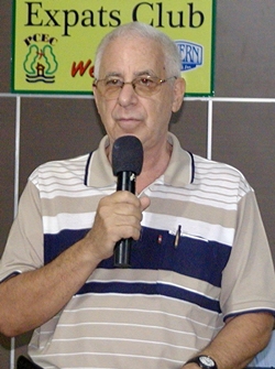 Master of Ceremonies Richard Silverberg opens the June 30th meeting of the Pattaya City Expats Club by inviting visitors and guests to introduce themselves, prior to calling on the speaker. Jerry Dean assists with the AV presentation.