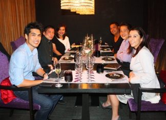 Siam Winery assistant winemaker Suppached Sasomsin (front left) and Tamara Demeo (front right), the Italian account manager for Siam Winery, enjoying the good food at Flare restaurant.