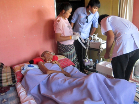 The nurse connects the machine.