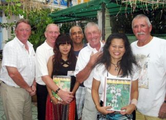 Tuesday winners pose with the staff at The Relax Bar.