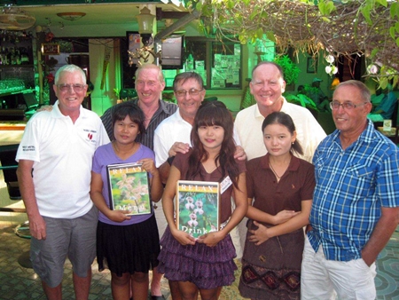 Tuesday winners pose with staff at the The Relax Bar.