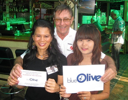 Mike Gerrard (center) received the player of the month award for June.