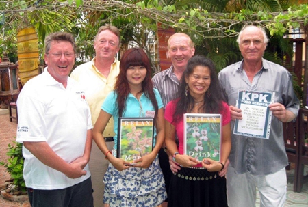 Tuesday’s winners pose with the staff at The Relax Bar.