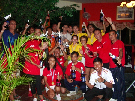 The players celebrate with their bottles of sparkling wine courtesy of Mont Clair.