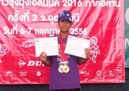 Thitirat Kanaphuet poses with her certificates and medals following her success in the recent junior tournament in Udon Thani.