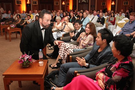 Stefan Sanchez, Artistic Director of Grand Opera Thailand (left) serenades the audience.
