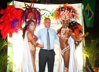H.E. Paulo Cesar Meira De Vasconcellos, the Brazilian ambassador to Thailand, poses with Zico’s dancers during the opening of the Brazilian food festival, Thursday, August 8.