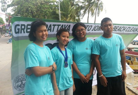 Interact students from Banglamung spend part of their holiday picking up trash on Jomtien Beach.