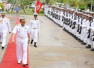 Adm. Surasak Rungrerngrom inspects the troops during the Marine Corps’ 58th anniversary celebrations in Sattahip.