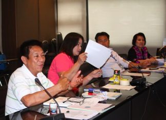Watcharee Wisithkas (left), head of the Saichol Network, and his committee meets with local and international groups to help protect Thai teens from HIV and unwanted pregnancies.