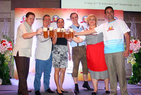 The management says ‘Prost’ with Paulaner Weissbier. (From left) Gerard Walker, Ken Whitty and his wife Kanpitcha Kongsombat, Markus Hesse, Peta Ruiter and general manager Philippe Kronberg.