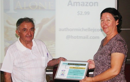 Board member Lawrie presents Michelle with a Certificate of Appreciation for her very interesting presentation. Her book is available as an ebook on Amazon, for only $2.99.
