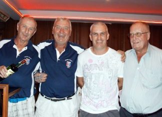 Medal winner Clint Hazlett (2nd right) poses with Lewiinski’s management, Colin, Peter and Jim.