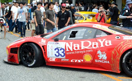 Phasin Lathuras’ Ferrari 458 Italia GT3 pulls out onto the pit lane.