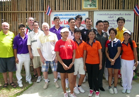 The players pose for a group photo.
