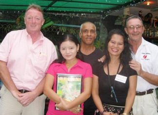 Bartley has double reason to celebrate Tuesday’s winners pose with the staff at The Relax Bar.