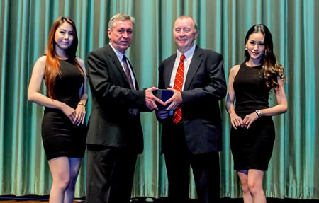Kingdom Property CEO Nigel Cornick (centre left) poses for a photo with James Quille, Chairman of Macquarie Global Property Advisors (centre right).