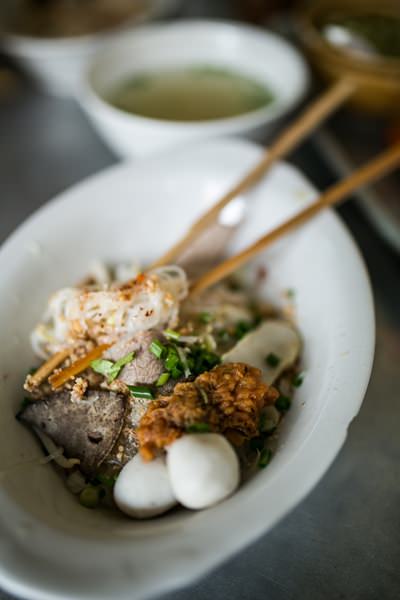 A popular breakfast choice for locals is a bowl of fish ball noodles at the old Naklua market.