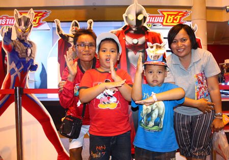 Children forming Ultraman Zero and Ultraman Dyna poses during the Ultraman event at Central Center Pattaya.