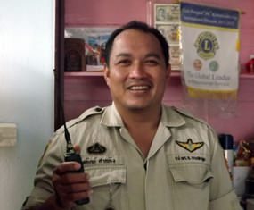 Sathir Khumklung works as a locksmith by day and a police volunteer at night.