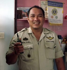 Sathir Khumklung works as a locksmith by day and a police volunteer at night.