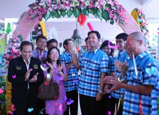 Mayor Itthiphol Kunplome rings the school bell to officially launch Pattaya School No. 9’s 58th anniversary celebrations.