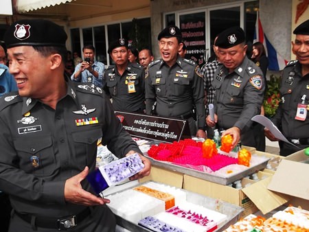 Police put on display the items confiscated in the latest crackdown on crime, which included a cache of sex toys and stimulants.