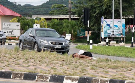 Police were able to wake up and chase off this homeless man before he rolled out into traffic in his sleep.